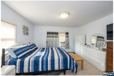 This income-producing two-family home lies in the heart of - photo 22