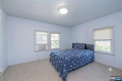 This income-producing two-family home lies in the heart of - photo 23