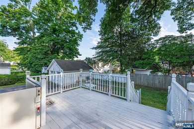 This income-producing two-family home lies in the heart of - photo 27