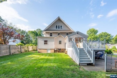 This income-producing two-family home lies in the heart of - photo 29
