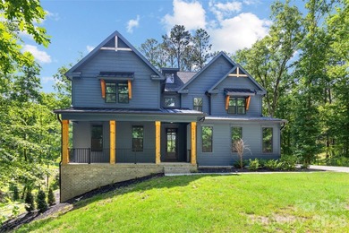 Welcome to lake living at its finest in the highly desirable - photo 1