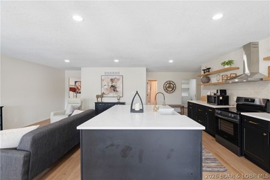 Lakefront living on 2 private acres at the 8MM near Laurie! - photo 12