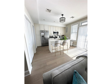 This beautifully designed two-bedroom, two and a half-bath - photo 3