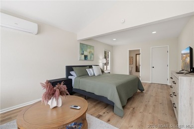 Lakefront living on 2 private acres at the 8MM near Laurie! - photo 14