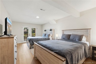Lakefront living on 2 private acres at the 8MM near Laurie! - photo 18