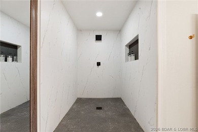 Lakefront living on 2 private acres at the 8MM near Laurie! - photo 30