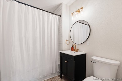 Lakefront living on 2 private acres at the 8MM near Laurie! - photo 31