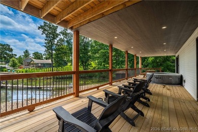 Lakefront living on 2 private acres at the 8MM near Laurie! - photo 33