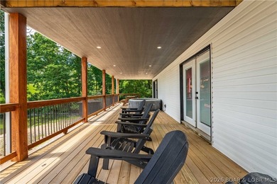 Lakefront living on 2 private acres at the 8MM near Laurie! - photo 34