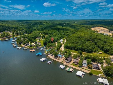 Lakefront living on 2 private acres at the 8MM near Laurie! - photo 49