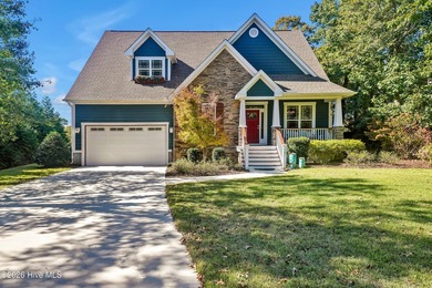 Tucked along a peaceful tidal creek, 101 Teal Circle is the kind - photo 1