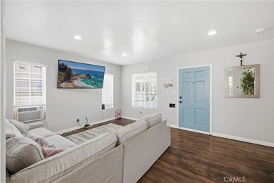 Nestled on a quiet tree lined street in North Long Beach, this - photo 11