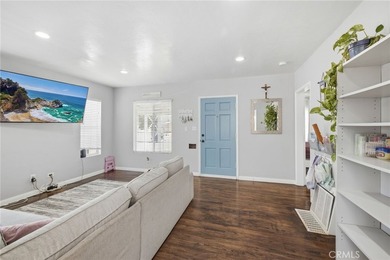 Nestled on a quiet tree lined street in North Long Beach, this - photo 12
