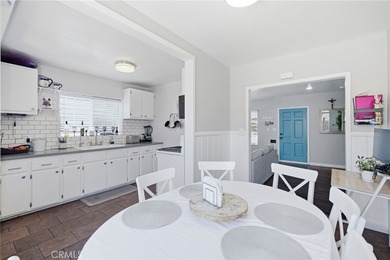 Nestled on a quiet tree lined street in North Long Beach, this - photo 15