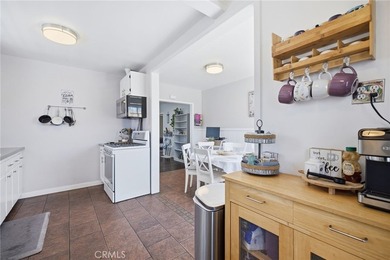 Nestled on a quiet tree lined street in North Long Beach, this - photo 21