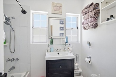 Nestled on a quiet tree lined street in North Long Beach, this - photo 26