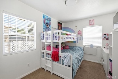 Nestled on a quiet tree lined street in North Long Beach, this - photo 27