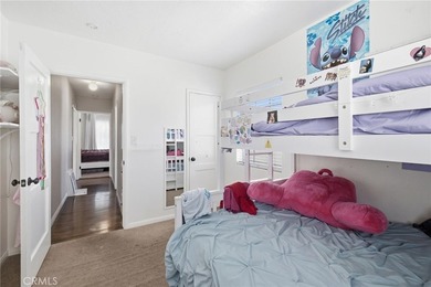 Nestled on a quiet tree lined street in North Long Beach, this - photo 28