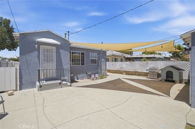Nestled on a quiet tree lined street in North Long Beach, this - photo 31