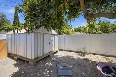 Nestled on a quiet tree lined street in North Long Beach, this - photo 34