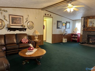 Country charm meets modern comfort! Nestled on 2 +- acres with a