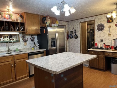 Country charm meets modern comfort! Nestled on 2 +- acres with a