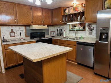 Country charm meets modern comfort! Nestled on 2 +- acres with a