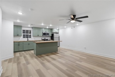 Experience the charm of lakeside living in this beautifully - photo 13