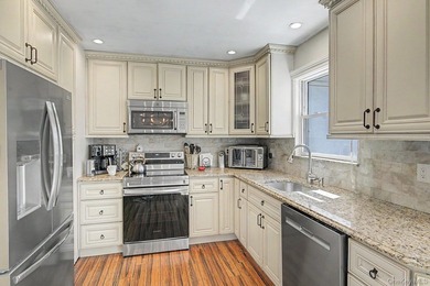 Welcome to 64 Sweetbriar Dr in Mastic - a spacious 6-bedroom - photo 6