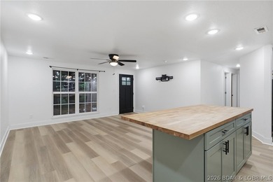 Experience the charm of lakeside living in this beautifully - photo 19