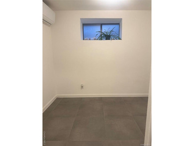 Lower-level condo in the heart of Forest Hills with flexible use - photo 11