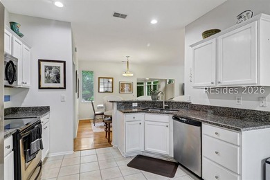 Tucked beneath a canopy of mature trees on the desirable - photo 15