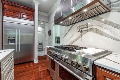 EXQUISITE. Seeing is believing. Amenities & storage galore - photo 16