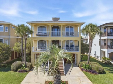 Breathtaking views of the shimmering Santa Rosa Sound await from - photo 1