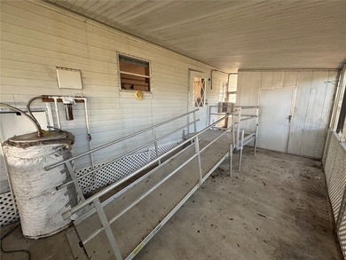 Welcome to this well-located 3-bedroom, 2-bath manufactured home - photo 3