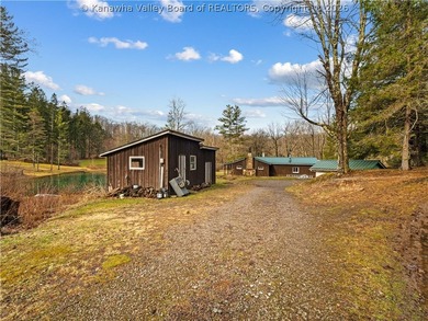 This 222-acre property quietly nestled between large tracts of - photo 7