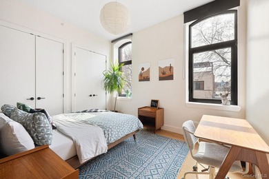 Oversized south-facing 2BR loft with 11' ceilings + private - photo 6