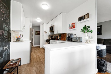 Welcome to this sprawling 3-bedroom, 2-bathroom corner unit in - photo 11