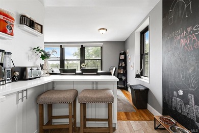 Welcome to this sprawling 3-bedroom, 2-bathroom corner unit in - photo 12