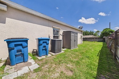 Tucked away in desirable NW Palm Bay, this spacious 3-bed - photo 35