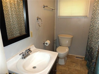 Rare to find a home on High Rock Lake under $500K. - photo 11