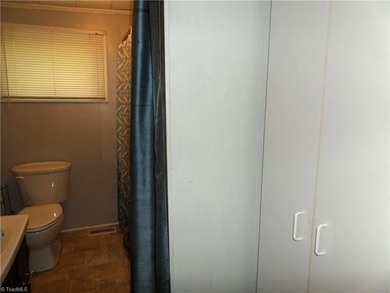 Rare to find a home on High Rock Lake under $500K. - photo 13