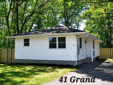 Beautifully renovated 3 bedroom, 1 bath home taken down to the - photo 1