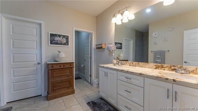 Lake view living with a boat slip at The Villas at Tuscany! This - photo 14