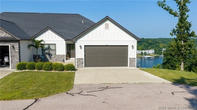 Lake view living with a boat slip at The Villas at Tuscany! This - photo 45