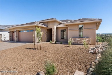 **JUST COMPLETED!** Experience luxury golf course living in the - photo 3