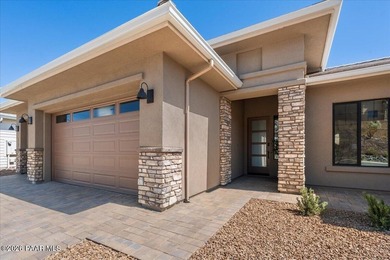 **JUST COMPLETED!** Experience luxury golf course living in the - photo 4