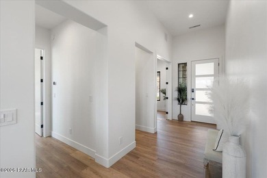 **JUST COMPLETED!** Experience luxury golf course living in the - photo 5