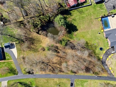 Highly sought after flat lot in Maplewood Estates with pond - photo 6