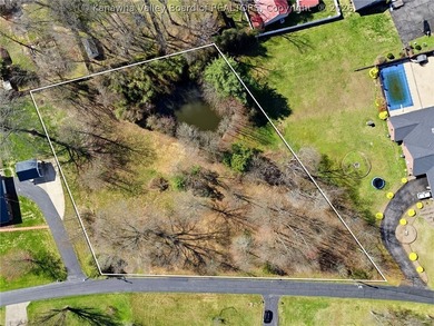 Highly sought after flat lot in Maplewood Estates with pond - photo 7